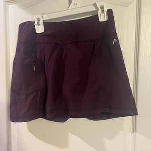 head purple tennis skirt
